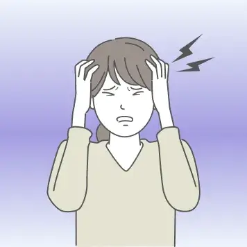 頭痛に悩む女性